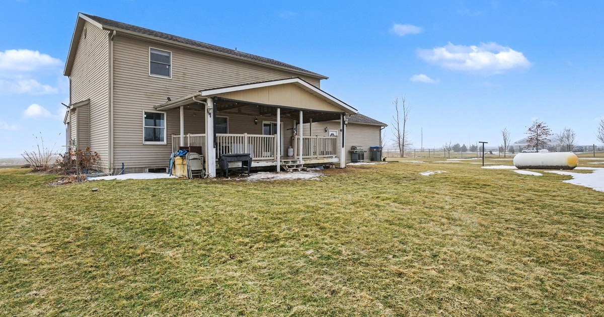 A two-story home with a covered rear porch.