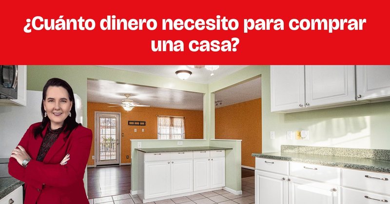 Una cocina con gabinetes blancos, piso de azulejo y una isla central.