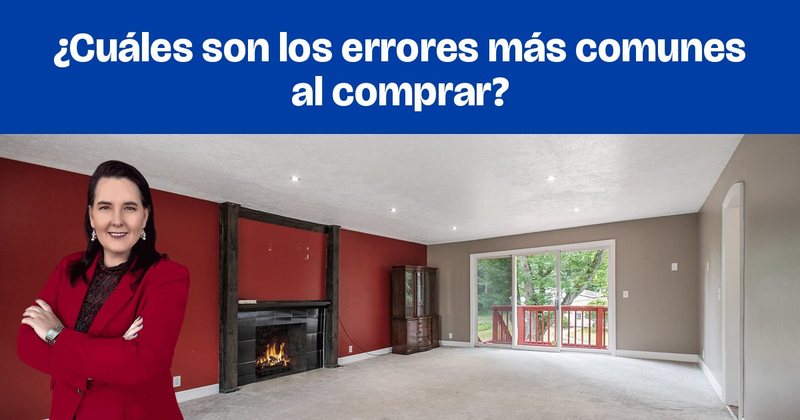Una sala con una pared roja de acento, chimenea y puerta corrediza.