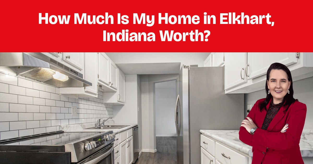 A kitchen with white cabinets, subway-tile backsplash, and stainless-steel appliances.