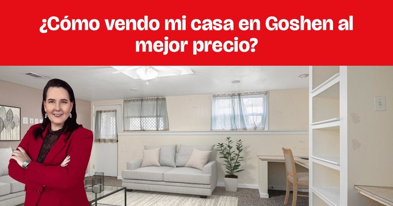 Una sala amueblada con sofás grises, una mesa de vidrio y estantes empotrados.