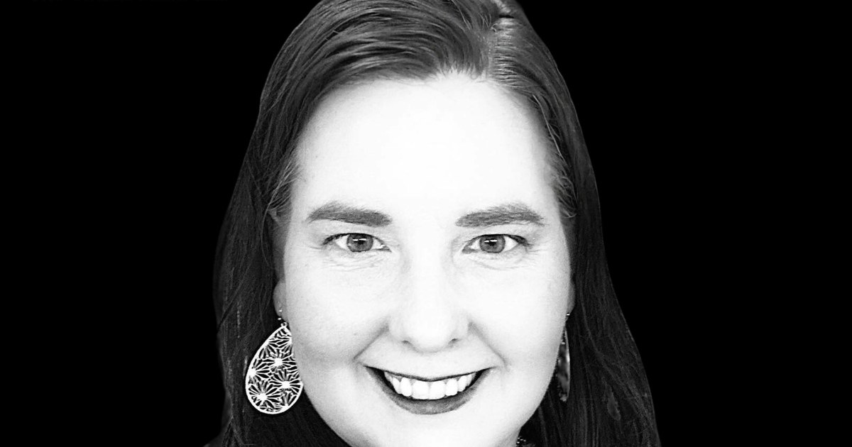 Black-and-white professional headshot of Lisa Collio.