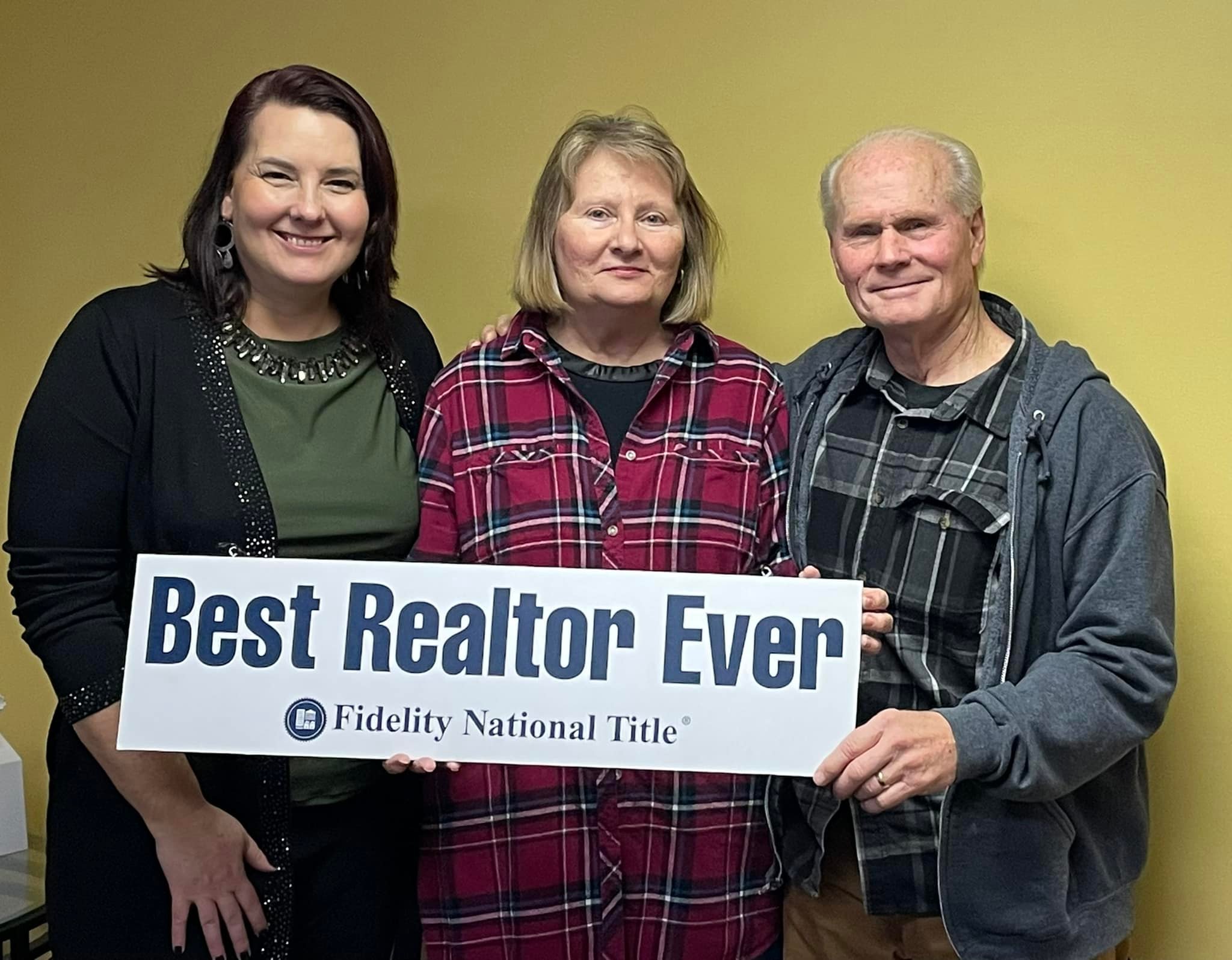 Clients of Lisa Collio celebrating a home purchase in Goshen and Elkhart, Indiana