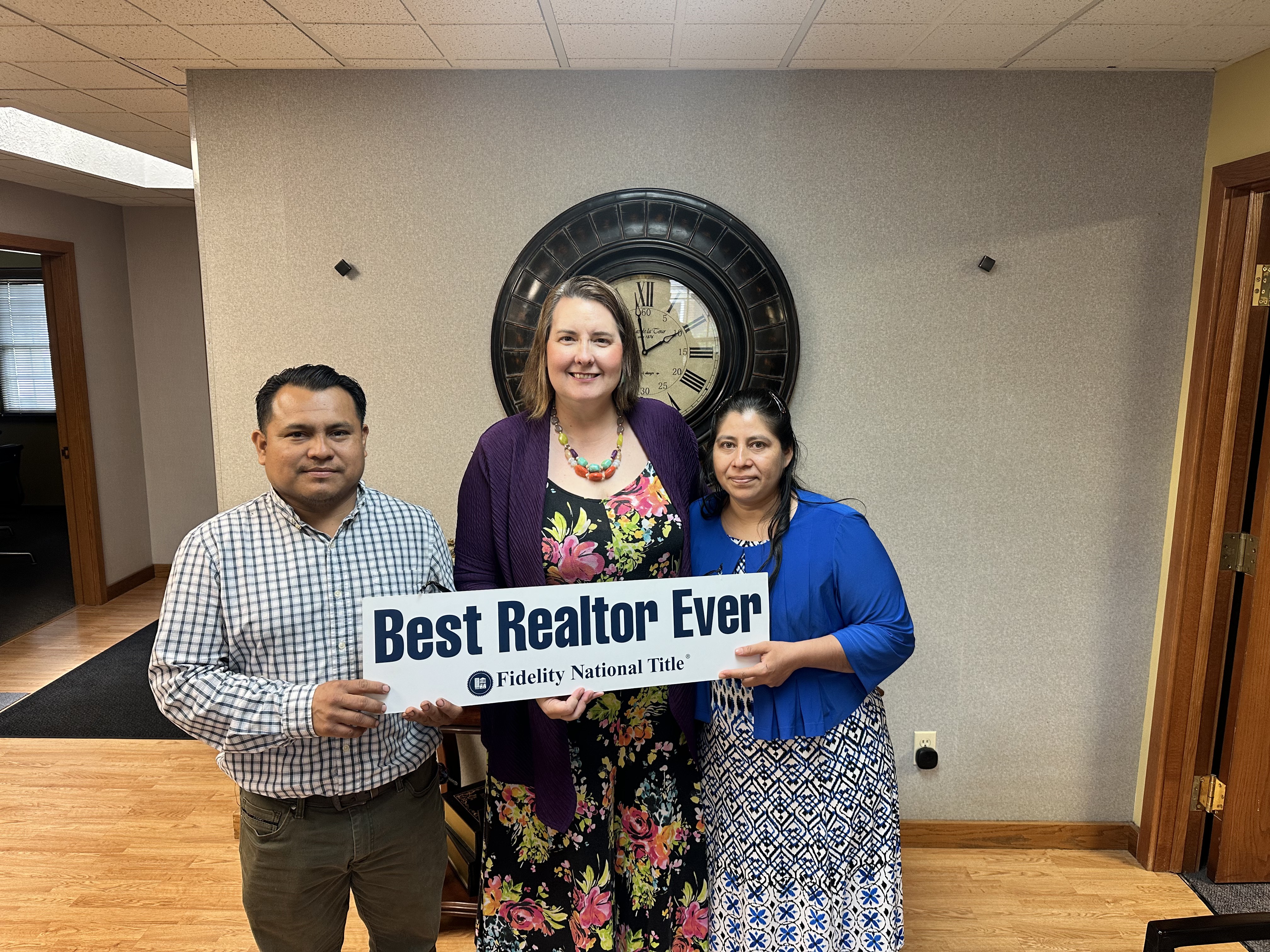 Clients of Lisa Collio celebrating a home purchase in Goshen and Elkhart, Indiana