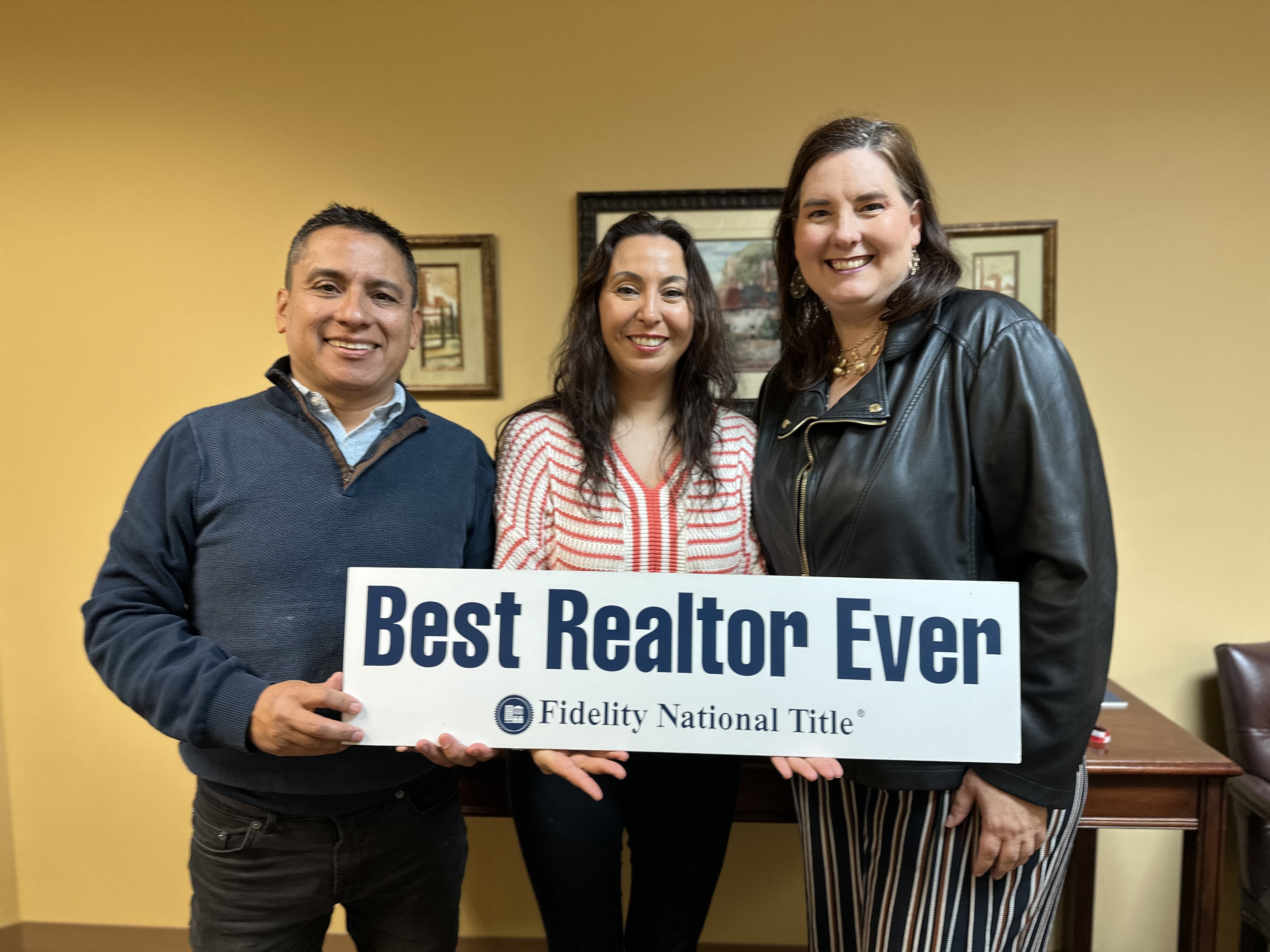 Clients of Lisa Collio celebrating a home purchase in Goshen and Elkhart, Indiana