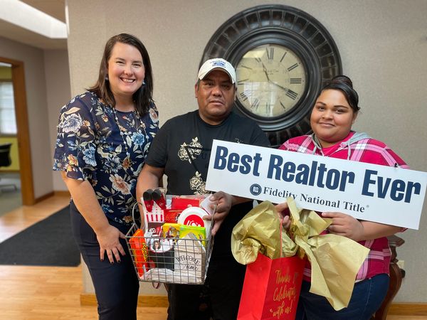Clients of Lisa Collio celebrating a home purchase in Goshen and Elkhart, Indiana
