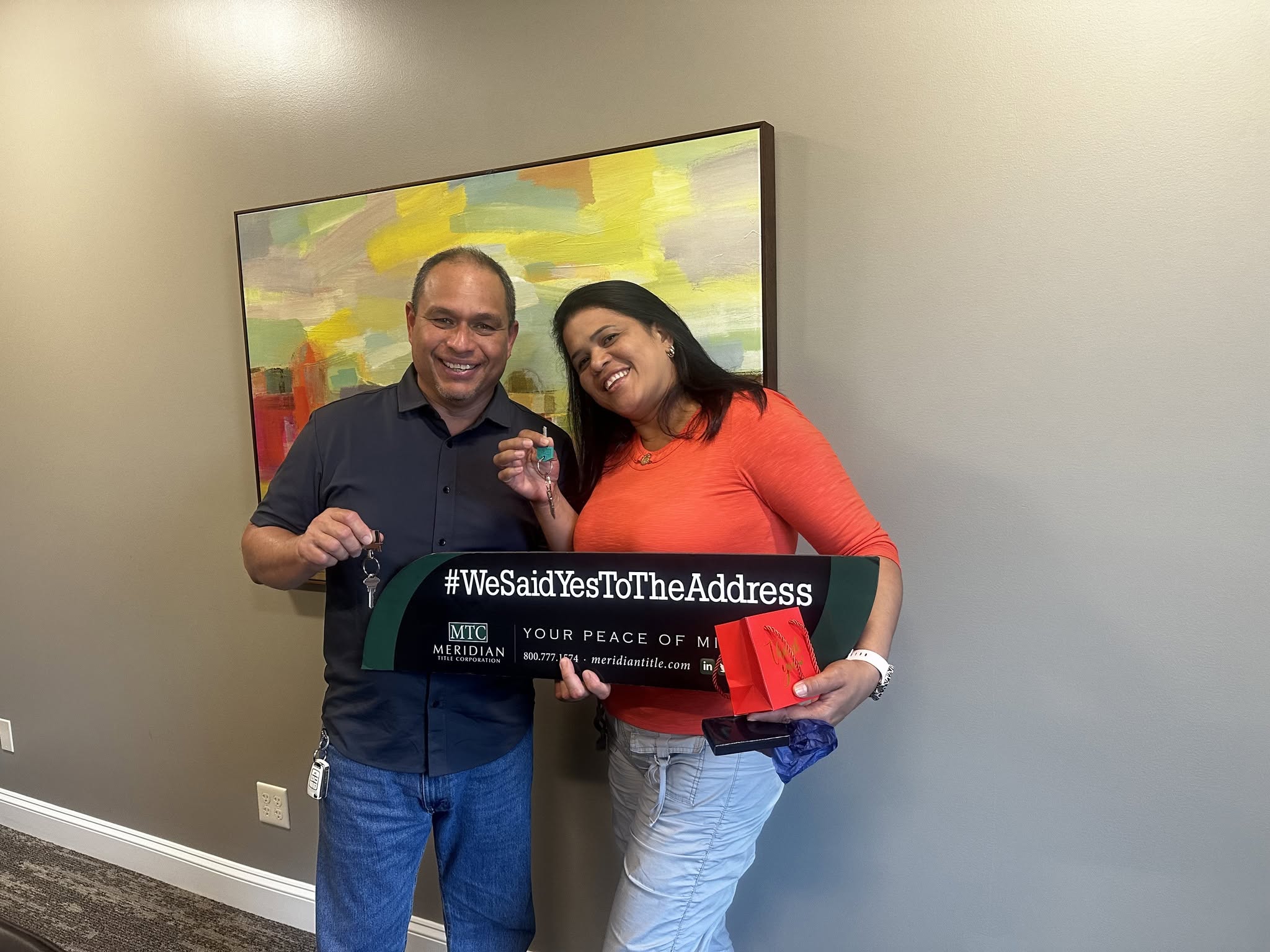 Clients of Lisa Collio celebrating a home purchase in Goshen and Elkhart, Indiana