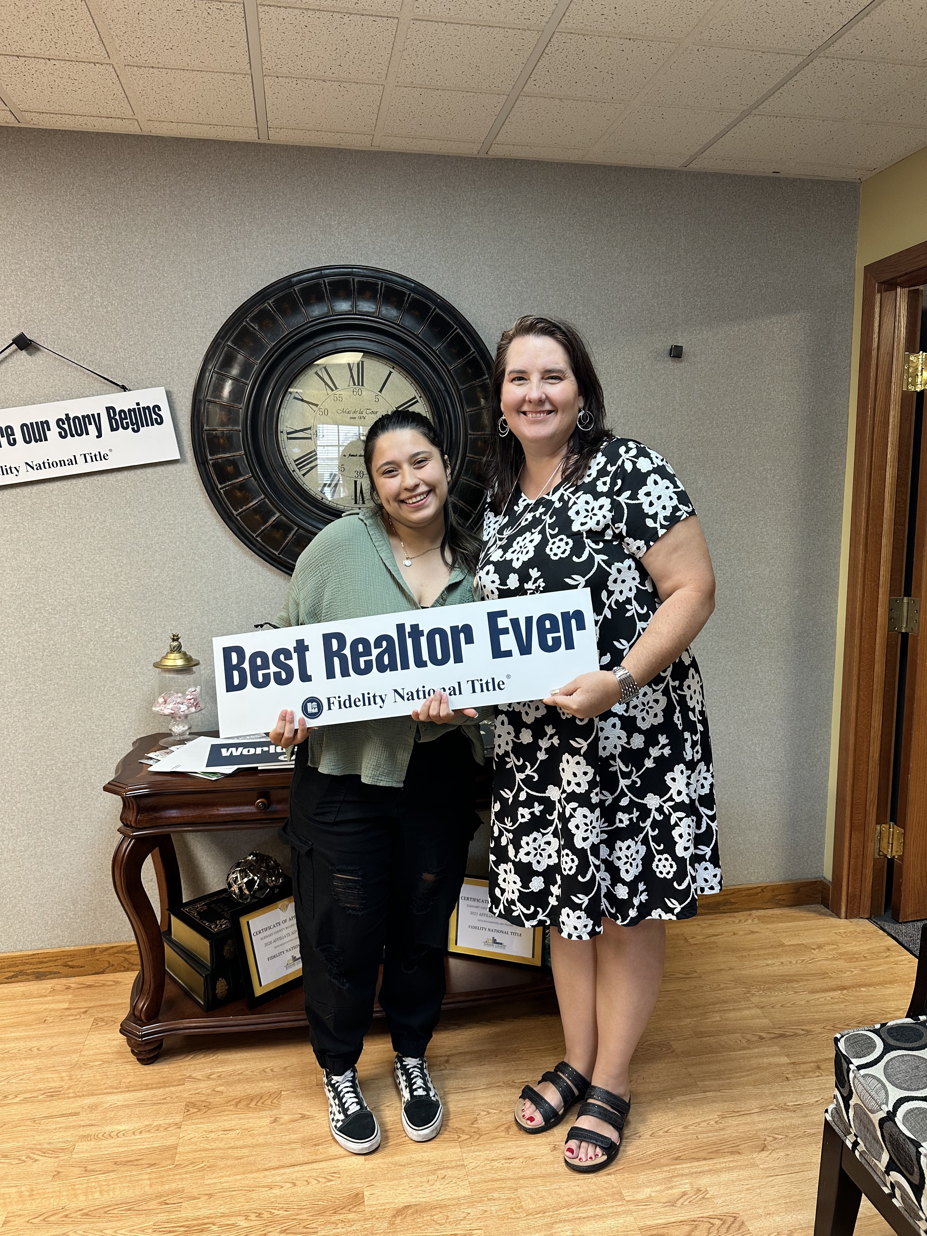 Clients of Lisa Collio celebrating a home purchase in Goshen and Elkhart, Indiana