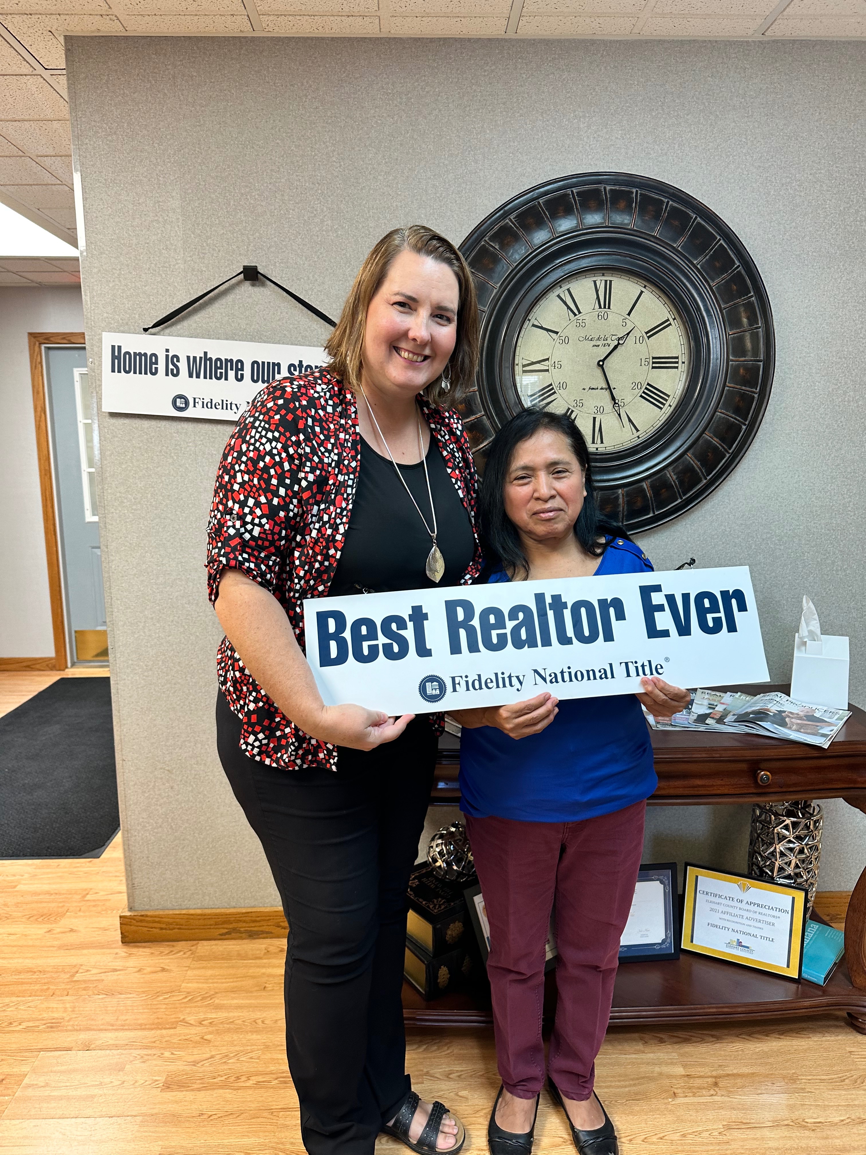 Clients of Lisa Collio celebrating a home purchase in Goshen and Elkhart, Indiana