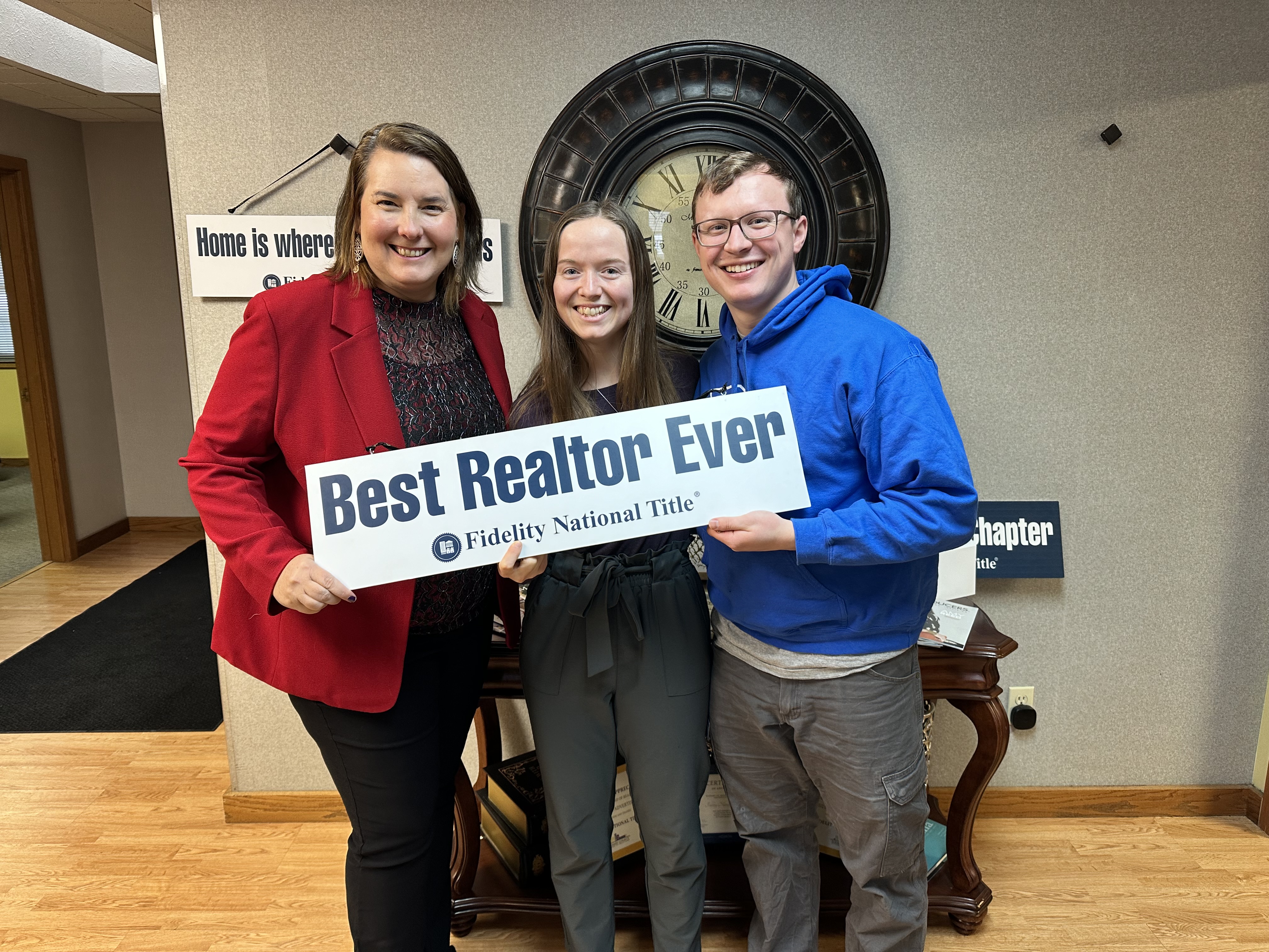 Clients of Lisa Collio celebrating a home purchase in Goshen and Elkhart, Indiana