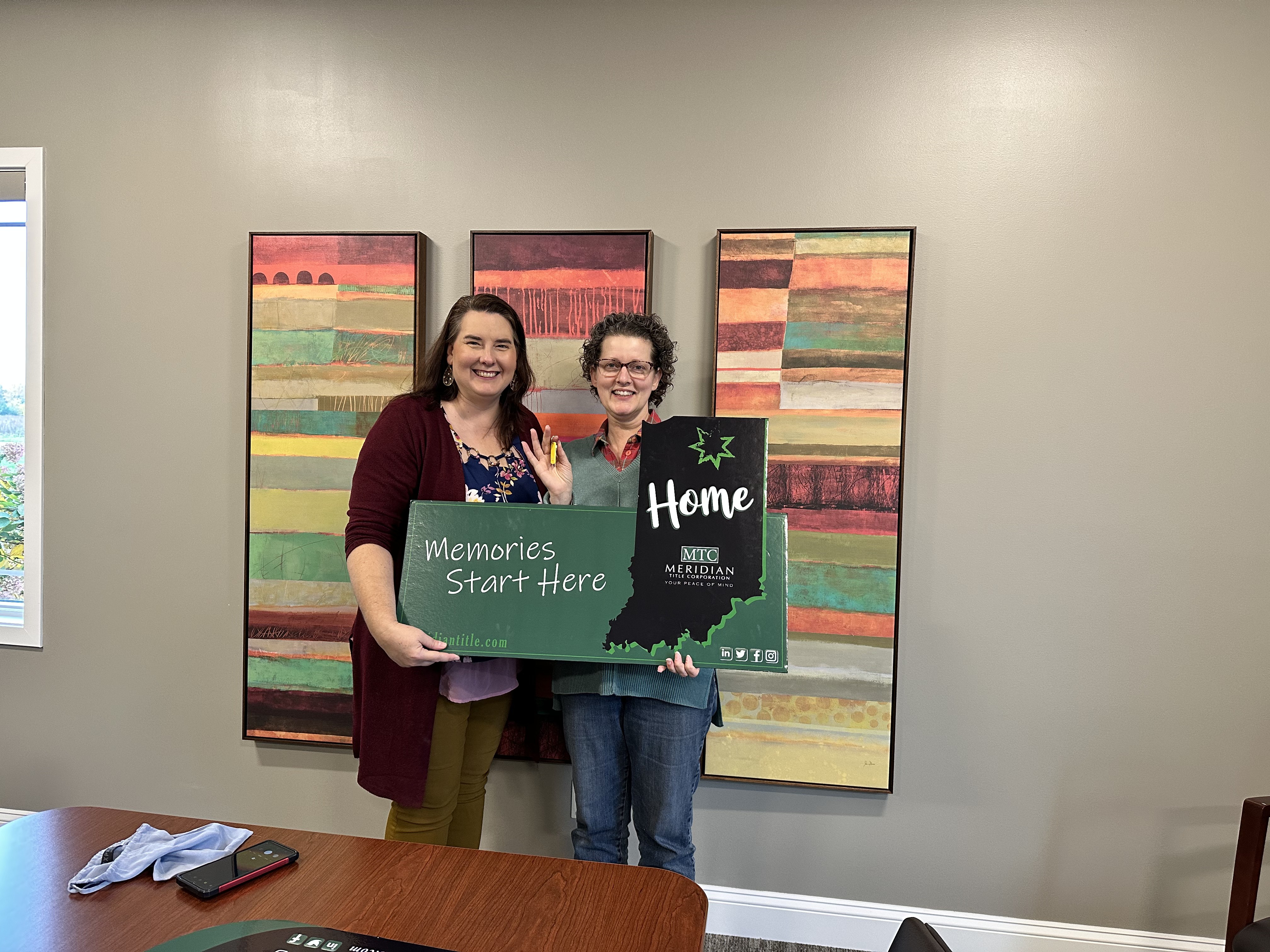 Clients of Lisa Collio celebrating a home purchase in Goshen and Elkhart, Indiana