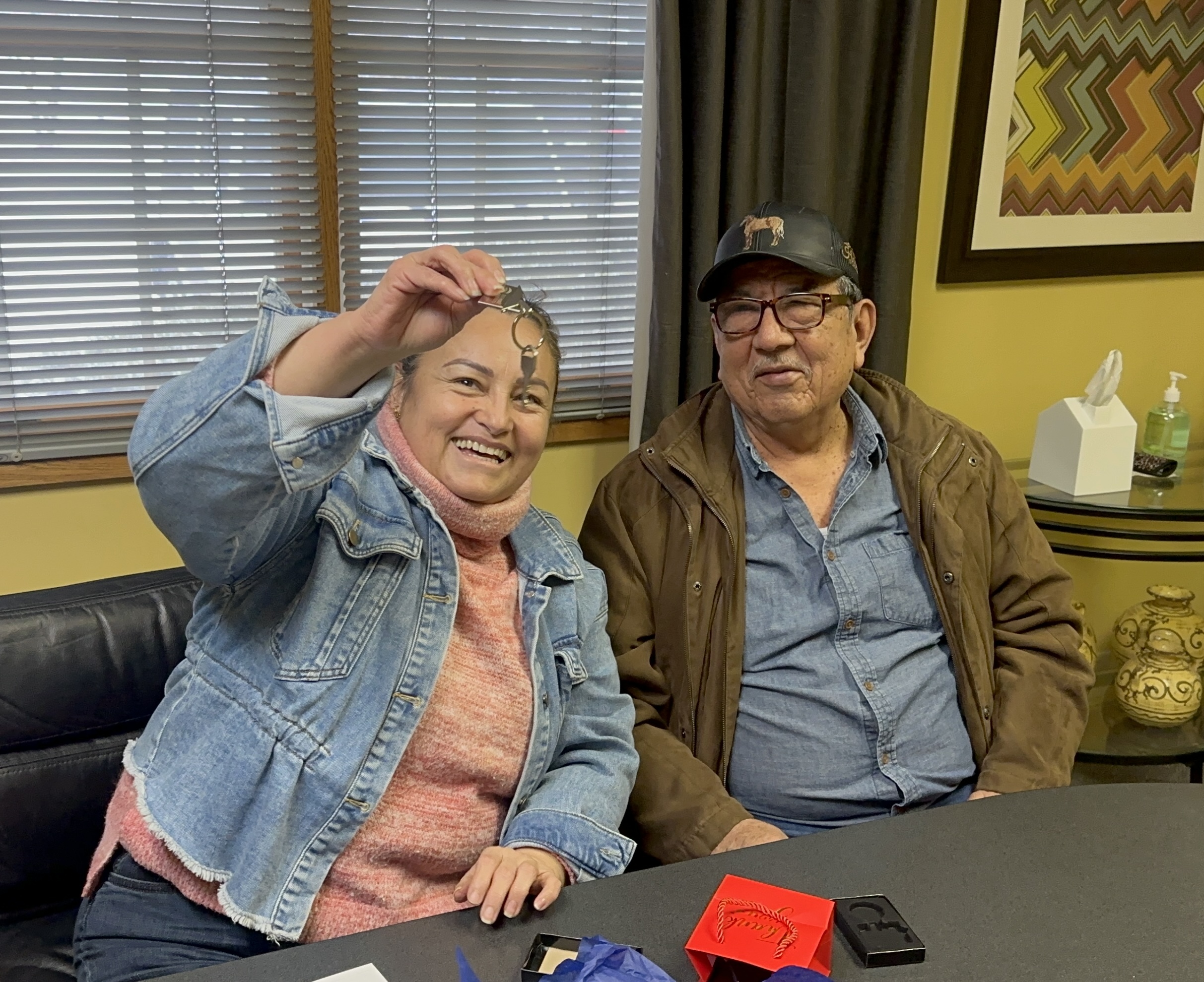 Clients of Lisa Collio celebrating a home purchase in Goshen and Elkhart, Indiana
